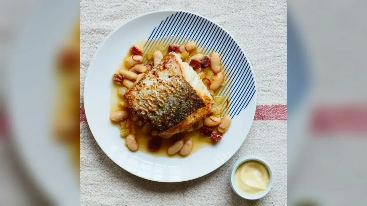 Pan-fried hake, white bean & chorizo broth