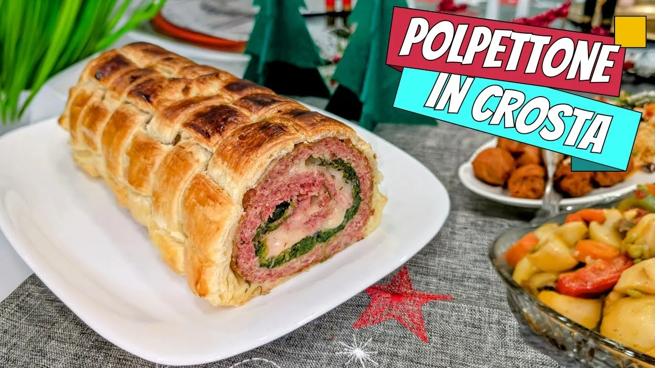 Rocambole de carne em crosta com recheio de espinafre, presunto e provolone, e acompanhamento de batatas e legumes assados