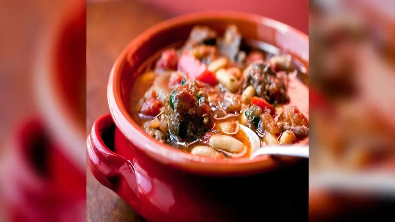 Spanish-style slow-cooked lamb shoulder & beans